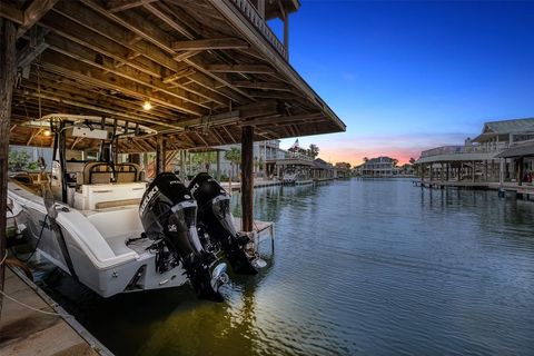 Photo of 1407 Tiki Drive, Tiki Island, TX 77554 (MLS # 86567869)