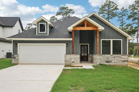 Photo of 15475 Arrowhead Loop W, Willis, TX 77378 (MLS # 47865082) Photo of 15475 Arrowhead Loop W, Willis, TX 77378 (MLS # 47865082)