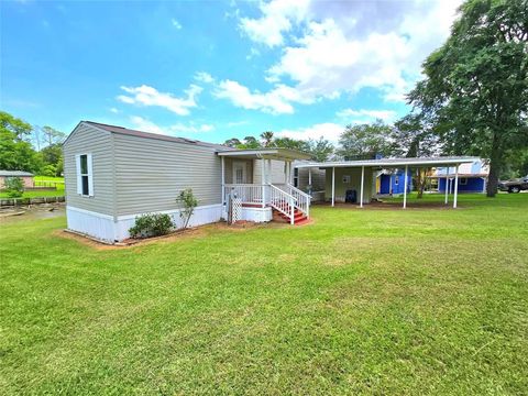 Photo of 51 Bluewater Drive, Point Blank, TX 77364 (MLS # 37864847)