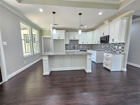 Photo of 4319 Trail Lake Drive, Houston, TX 77045 (MLS # 6897735)