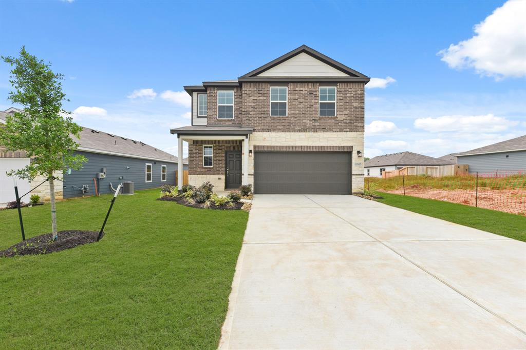 11865 Whirlaway Drive, Willis, Texas image 1