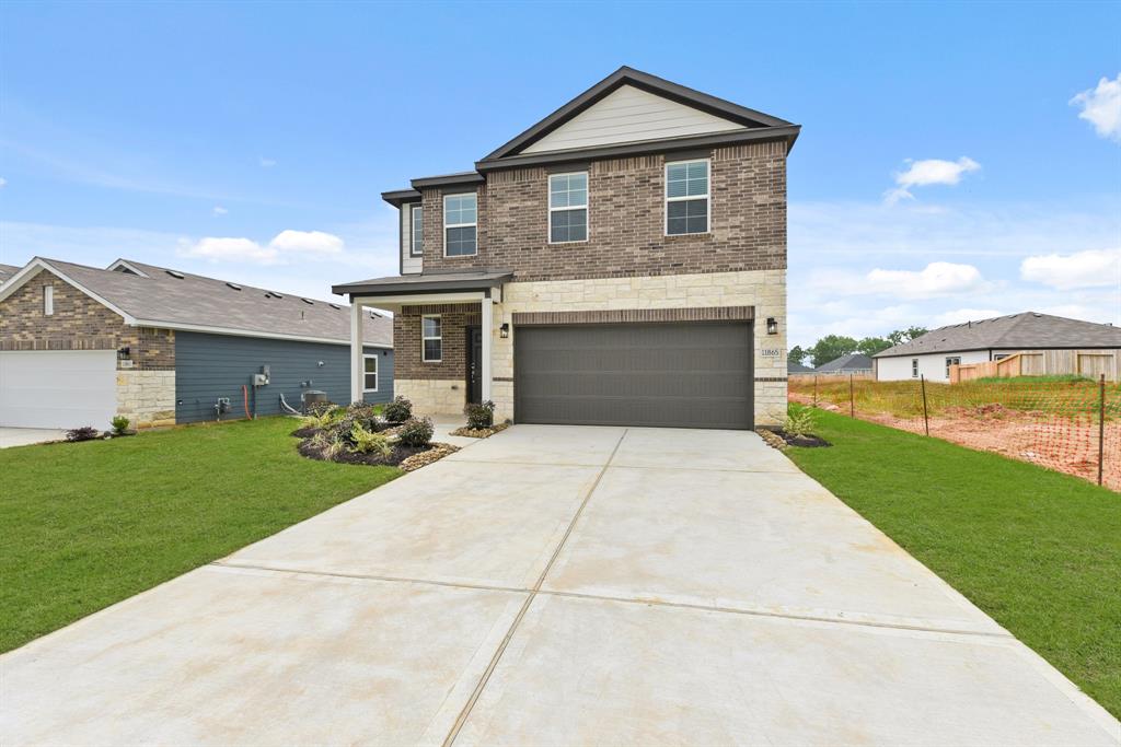 11865 Whirlaway Drive, Willis, Texas image 2