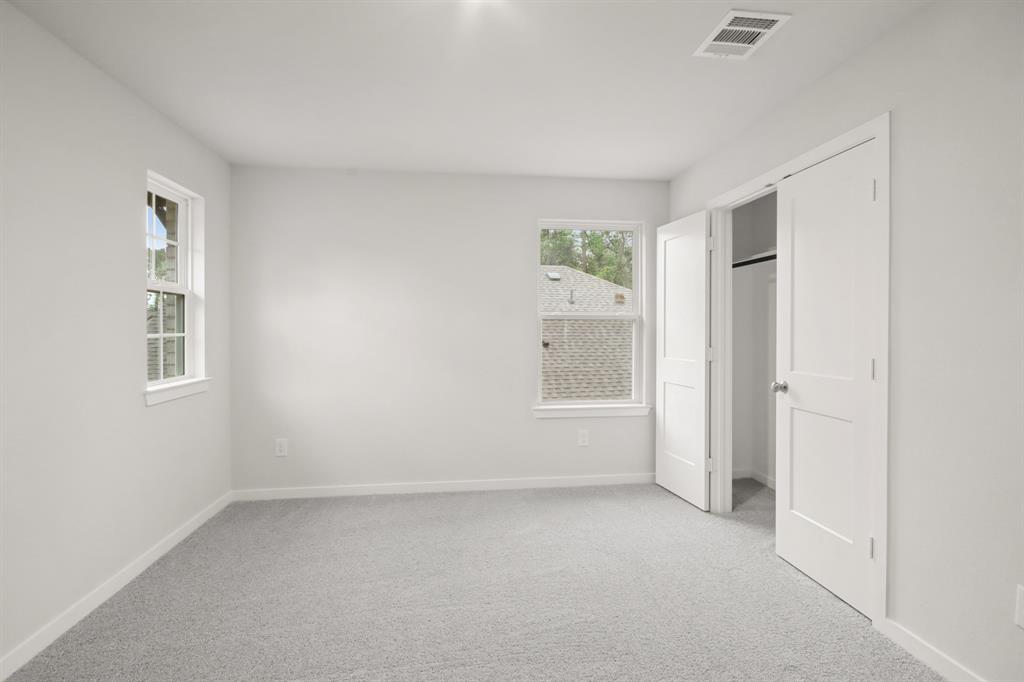 215 Garden Rose Trail, Conroe, Texas image 18