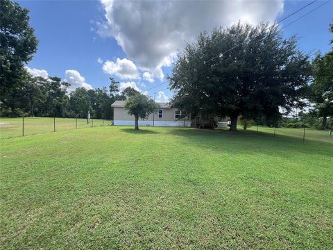 Photo of 1208 Fm 3459, Onalaska, TX 77360 (MLS # 52797929)