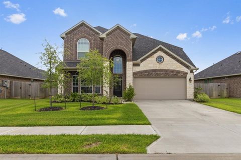 Photo of 12114 Champions Forest Drive, Mont Belvieu, TX 77535 (MLS # 91530390)
