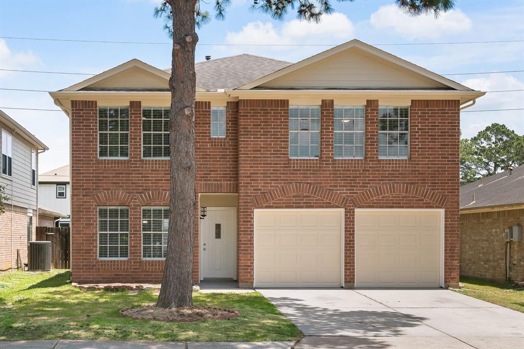 19222 Wading River Drive, Tomball, Texas image 1