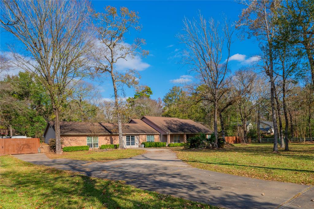 22306 Three Pines Drive, Hockley, Texas image 1