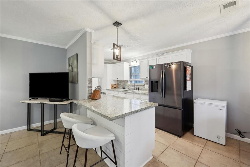 1845 King Arthur Court, Pinehurst, Texas image 10