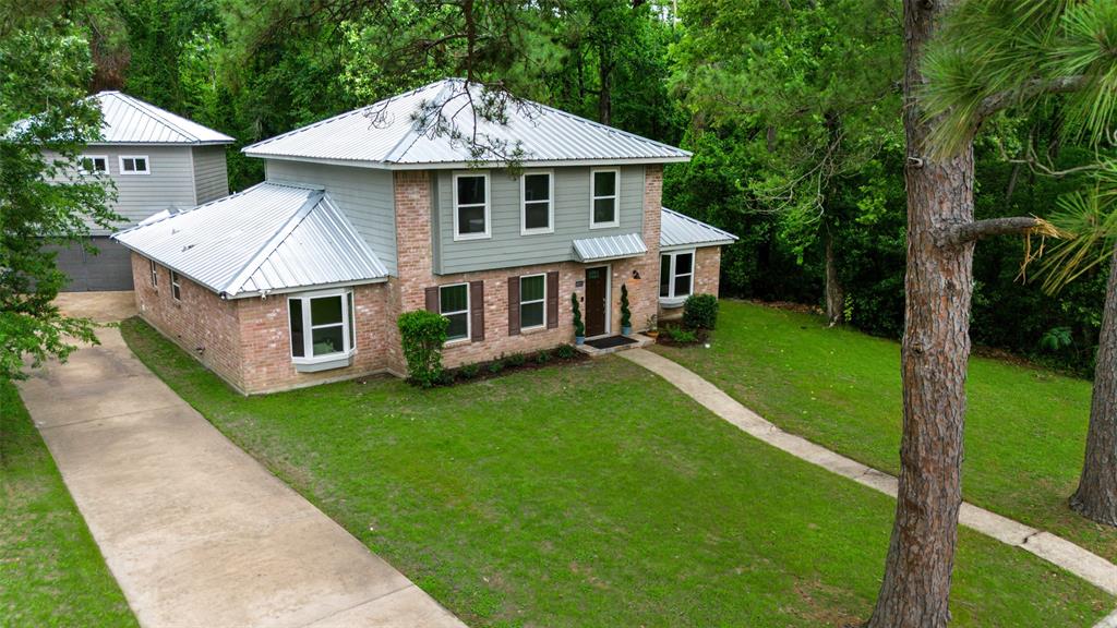 10311 Woodhollow Drive, Conroe, Texas image 1