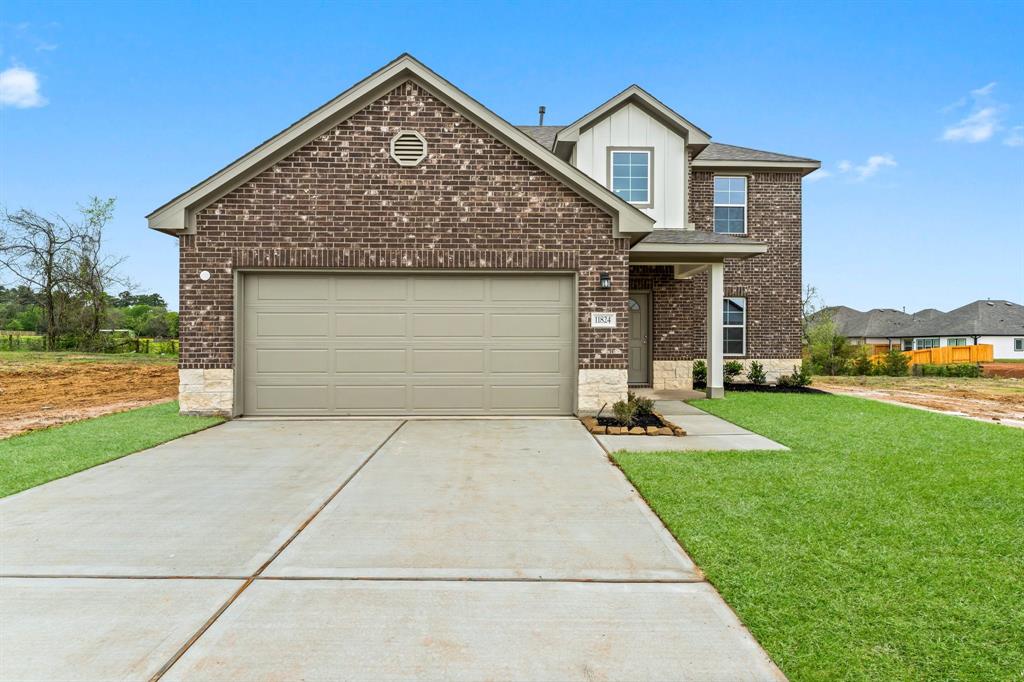 11824 Whirlaway Drive, Willis, Texas image 1