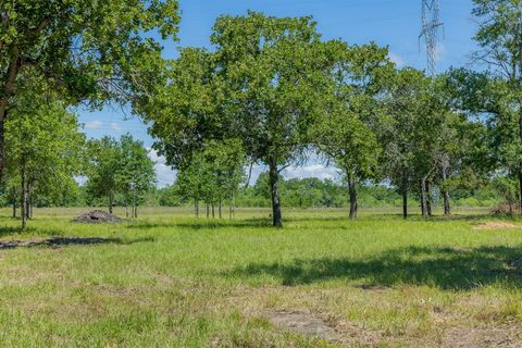 Photo of 6593 Atakapan Trail Trl, Bedias, TX 77831 (MLS # 36667840)