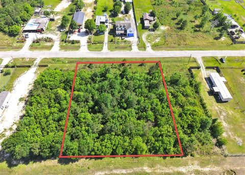 Photo of 1529 County Road 3540, Cleveland, TX 77327 (MLS # 23918834)