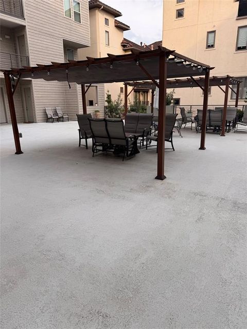 Photo of 4819 Caroline Street #103, Houston, TX 77004 (MLS # 77004868)