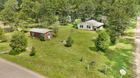 Photo of 0 Squire Ln, Shepherd, TX 77371 (MLS # 86675132)