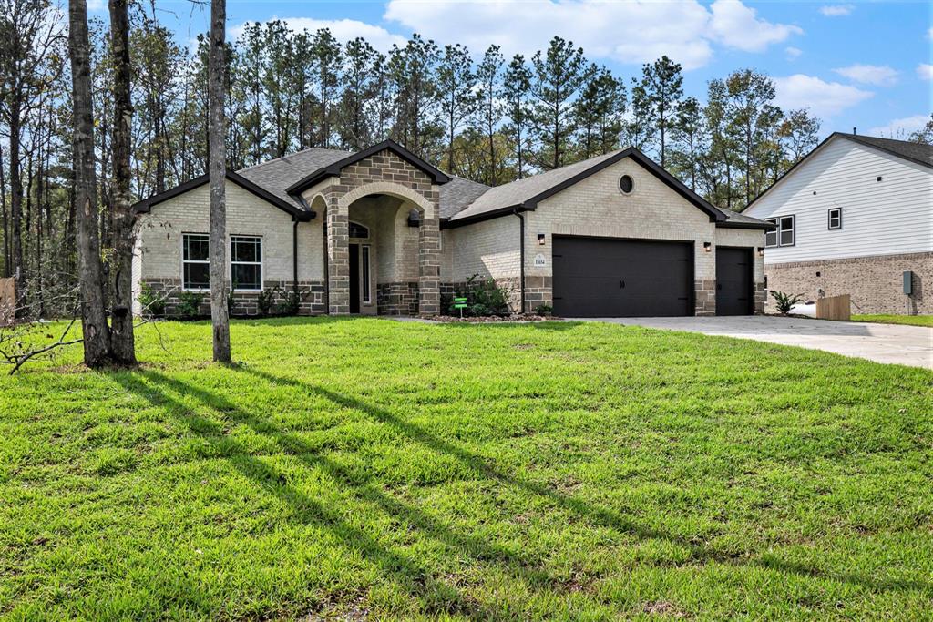 11654 Wilgers Way Way, Willis, Texas image 1
