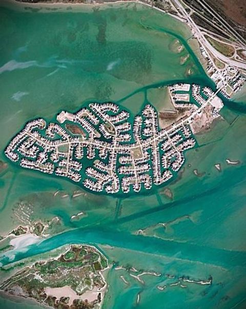 Photo of 58 Bamboo Drive, Tiki Island, TX 77554 (MLS # 25801115)