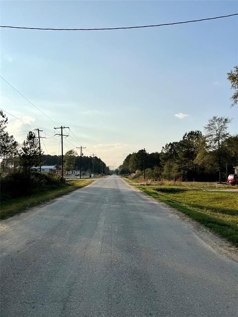 Photo of 302 County Road 3402, Cleveland, TX 77327 (MLS # 76684688)