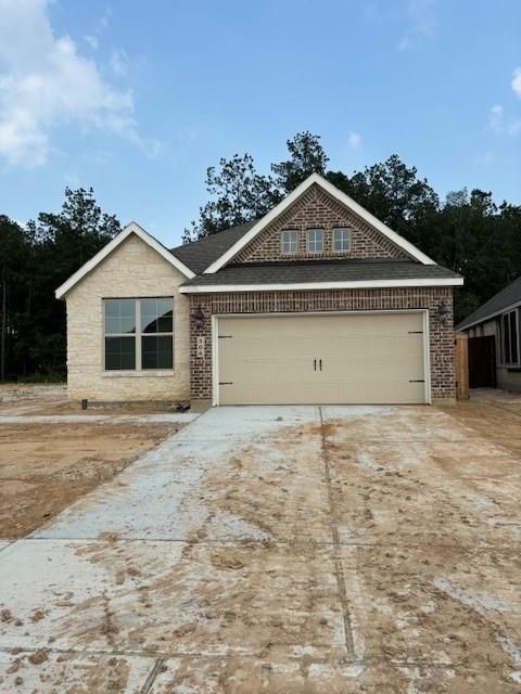 Single Family Residence in New Caney TX 306 Dam Drop Drive.jpg