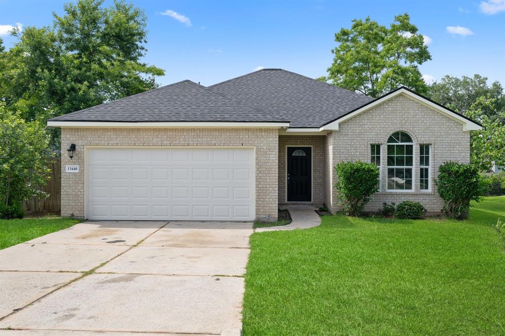 13446 Lake Breeze Lane, Willis, Texas image 1