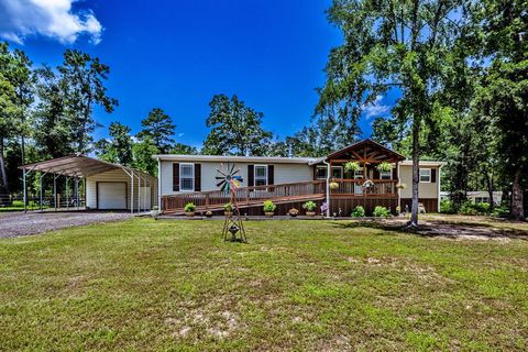 Photo of 119 Utley Road, Huntsville, TX 77320 (MLS # 24135268)