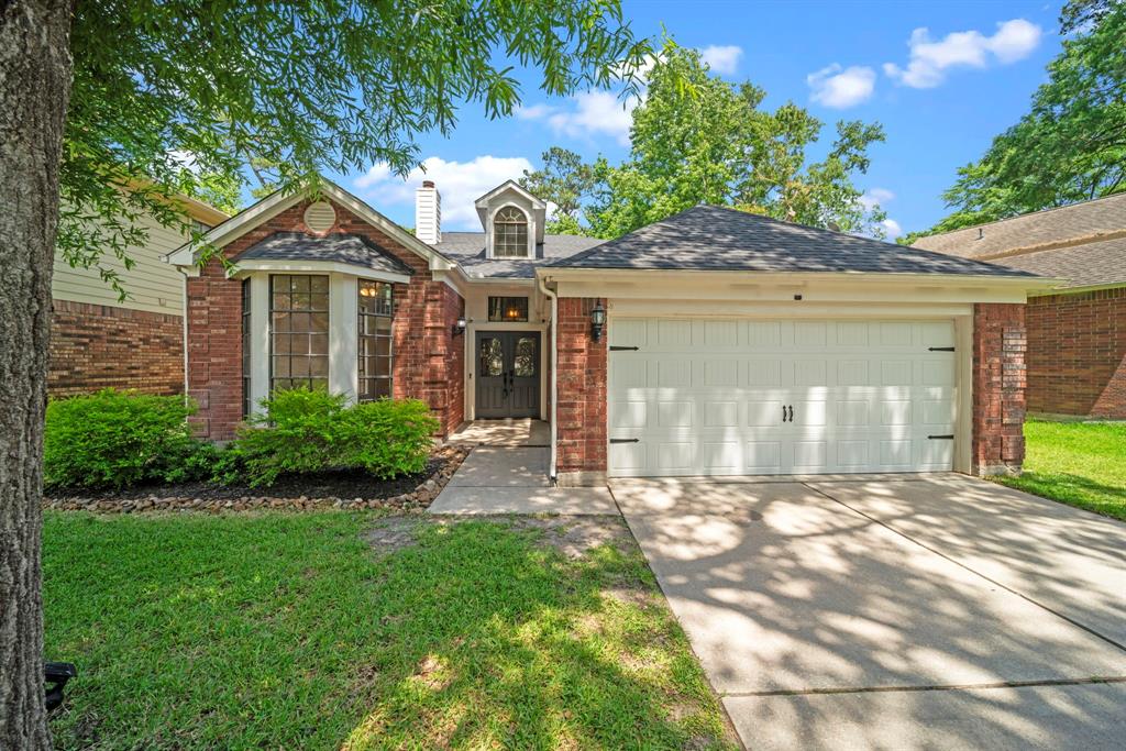 5002 Otter Peak Drive, Kingwood, Texas image 1