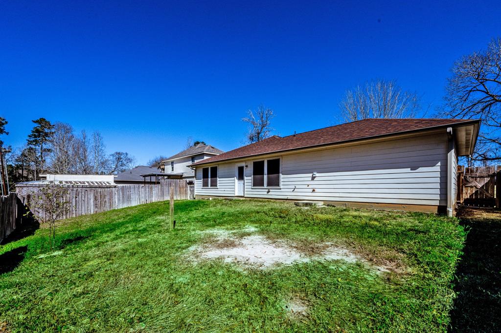 14089 Broken Arrow Drive, Willis, Texas image 17