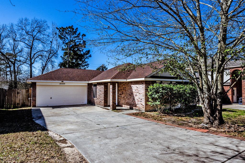 14089 Broken Arrow Drive, Willis, Texas image 1