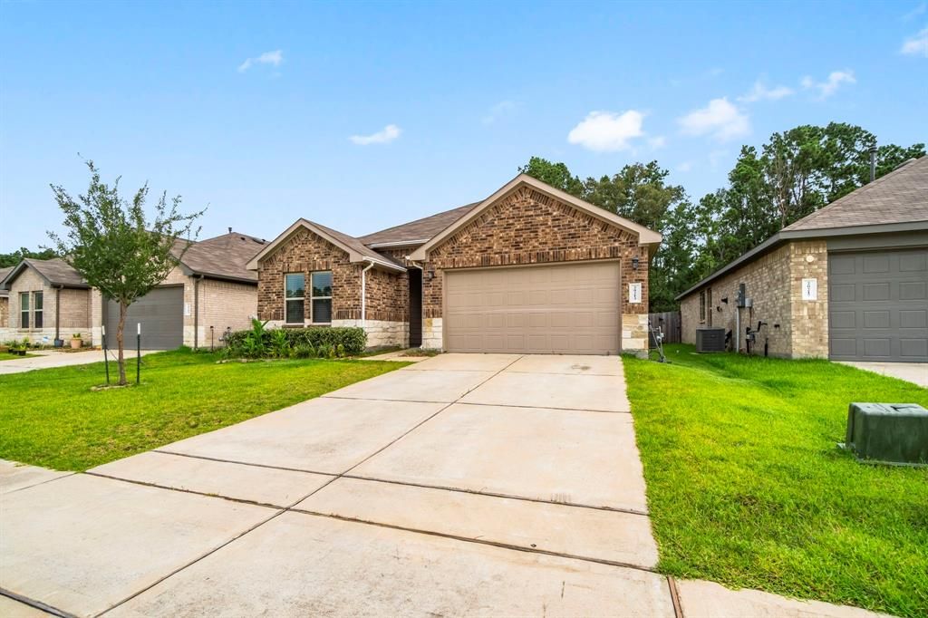 Photo of 20213 Portbec Drive, New Caney, TX 77357 (MLS # 71696277)
