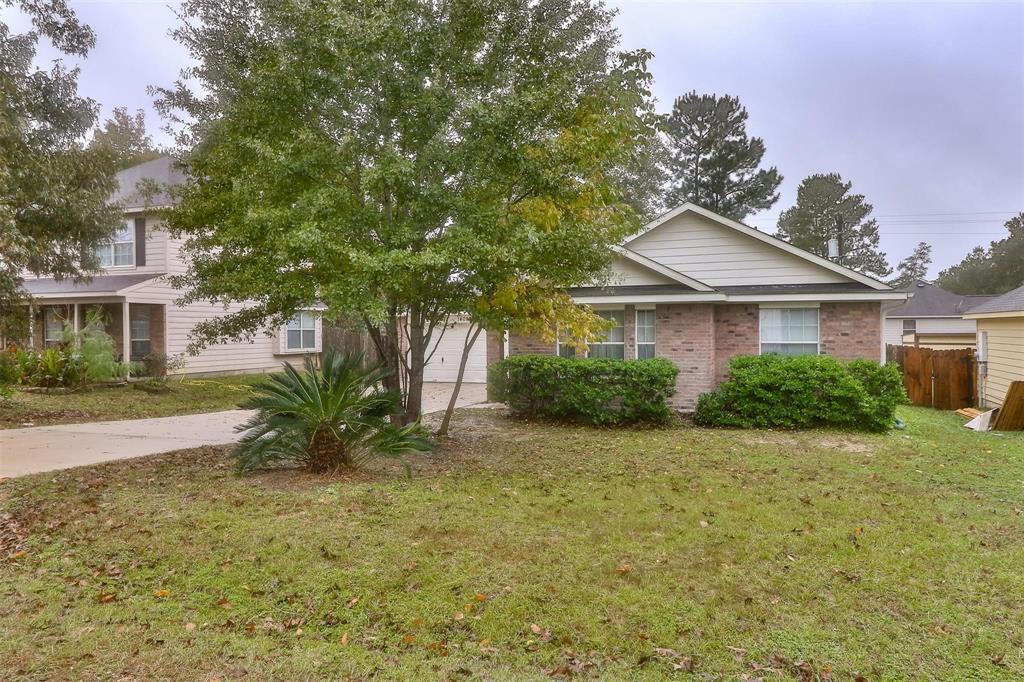 14089 Broken Arrow Drive, Willis, Texas image 3