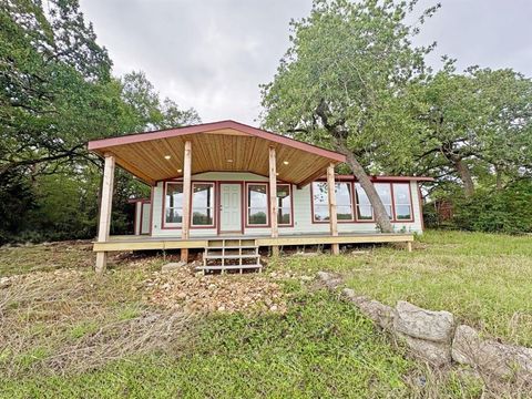 Photo of 106 Caddo, Smithville, TX 78957 (MLS # 28563544)