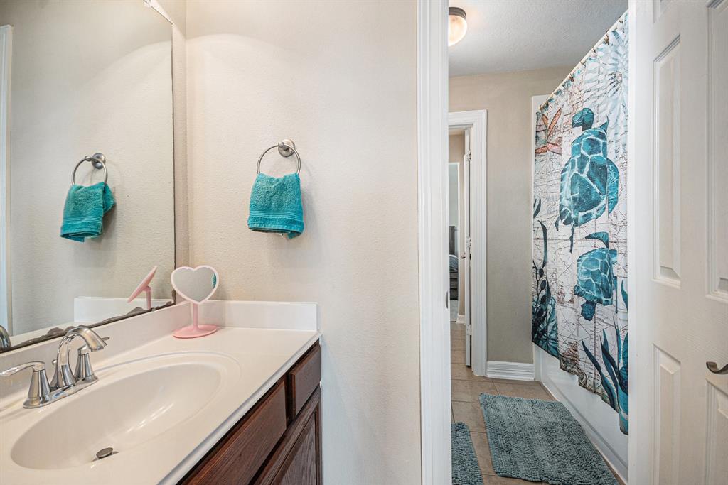 9011 Tumblewood Drive, Beach City, Texas image 36