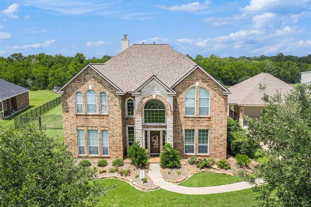 9011 Tumblewood Drive, Beach City, Texas image 1