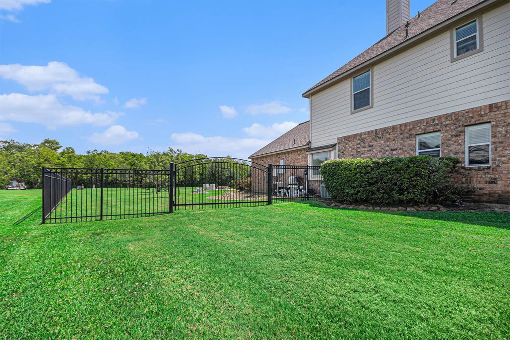 9011 Tumblewood Drive, Beach City, Texas image 13