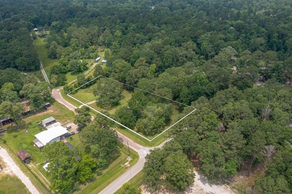 Photo of 17396 Woods Drive, New Caney, TX 77357 (MLS # 22622779)