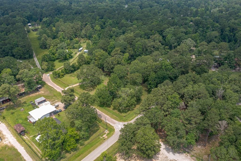Photo of 17396 Woods Drive, New Caney, TX 77357 (MLS # 22622779)