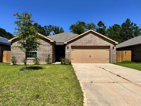 Photo of 10781 Castle Rock Drive, Cleveland, TX 77328 (MLS # 88255274)