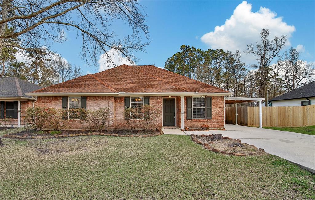 720 Springwood Drive, Conroe, Texas image 1