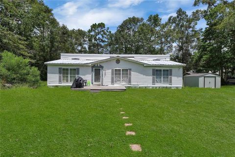 Photo of 375 County Road 3892 E, Cleveland, TX 77328 (MLS # 71438242)
