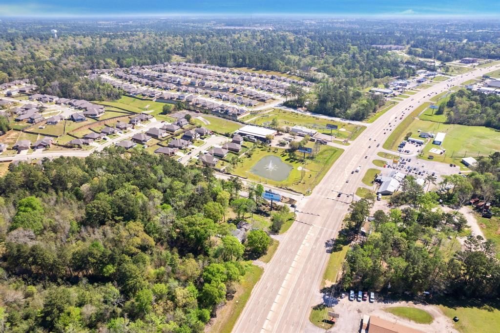 Photo of 6020 Highway 105, Conroe, TX 77304 (MLS # 70615398)
