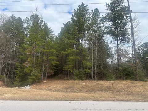 Photo of 5 Rim Rock Road, Huntsville, TX 77340 (MLS # 41350542)