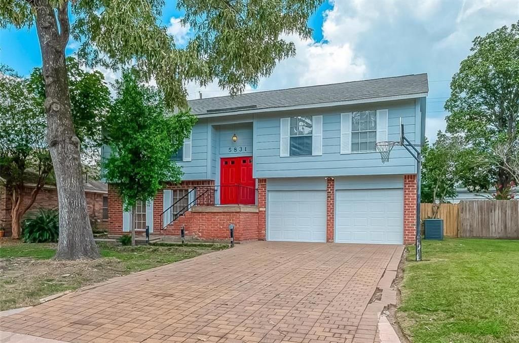 Photo of 5831 Caldicote Street, Humble, TX 77346 (MLS # 97933141)