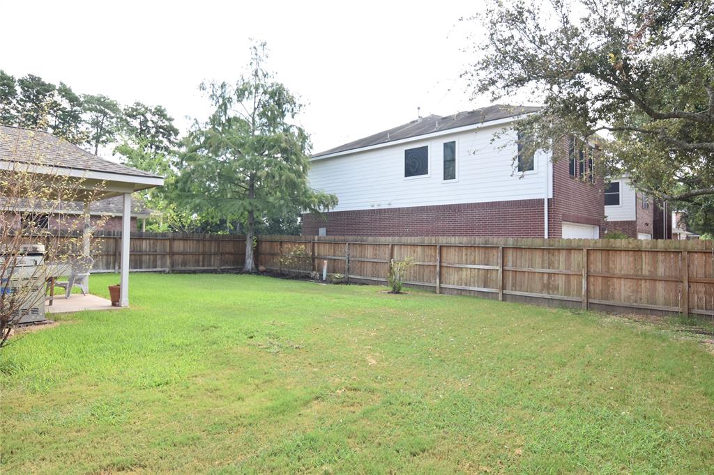 9619 Babbling Spring Court, Tomball, Texas image 28