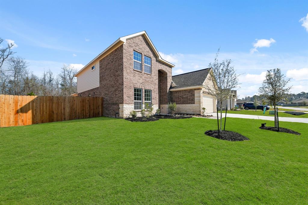 297 Galant Fox Way, New Caney, Texas image 2