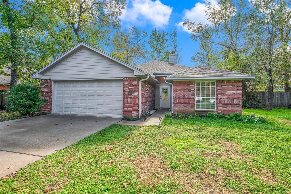 6719 Woodland Oaks, Magnolia, Texas image 1