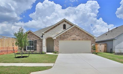 Single Family Residence in Pinehurst TX 4043 Colony River Rock Boulevard.jpg