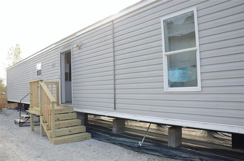 Photo of 725 County Road 5007, Cleveland, TX 77327 (MLS # 10662987)