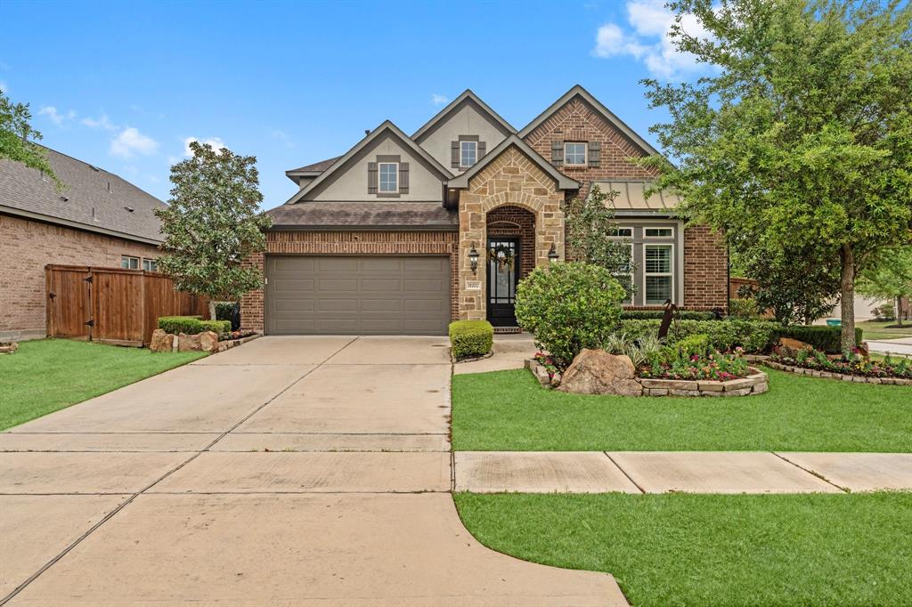 11202 Puckett River Drive, Cypress, Texas image 1