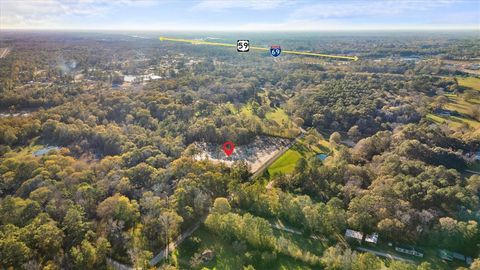Photo of 628 County Road 377, Cleveland, TX 77327 (MLS # 93867581)