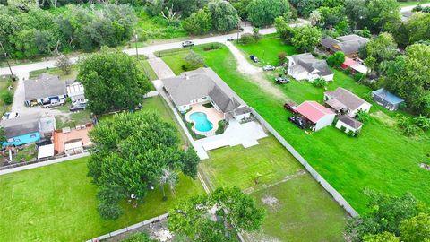 Photo of 13902 Ambrose Street, Houston, TX 77045 (MLS # 29067738)