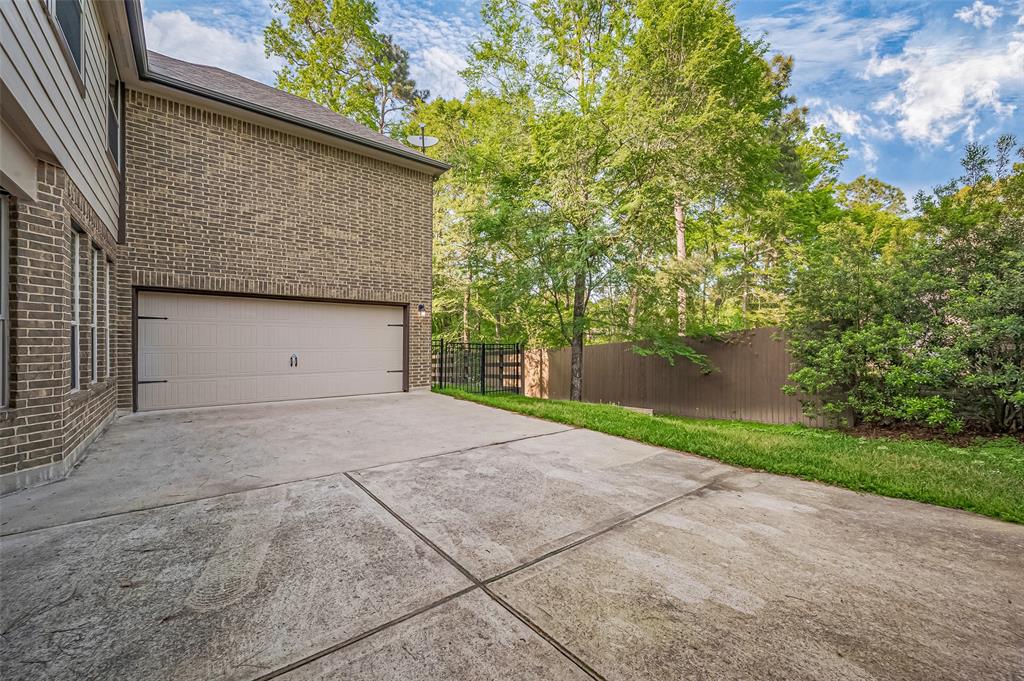 11306 Longmire Creek Court, Conroe, Texas image 35